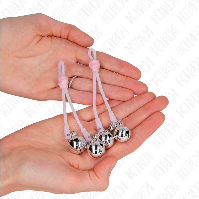 KINK - PINÇAS LUMINOSAS PARA MAMILOS FORMA DE CAVEIRA COM CASCAVEL SONORA AJUSTÁVEL ROSA/PRATEADA